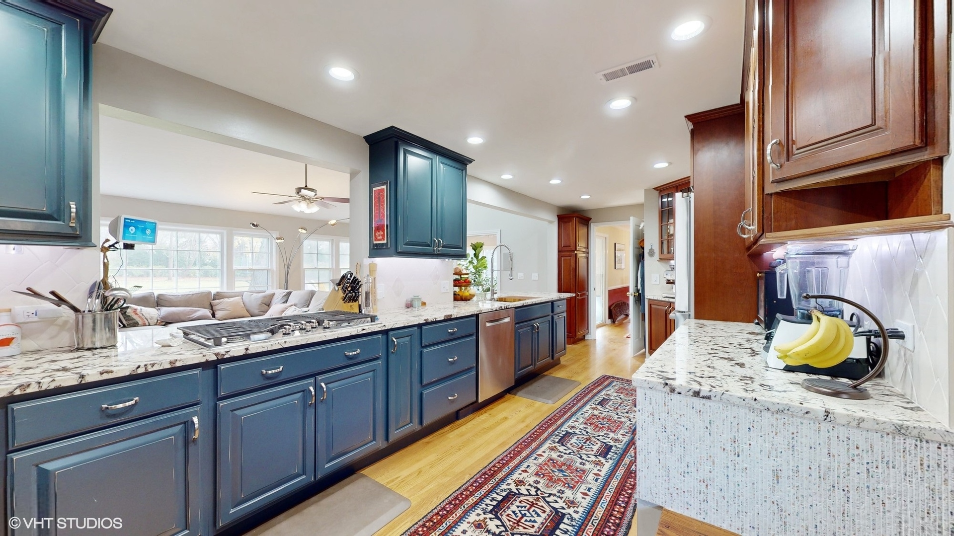 1925 Maple Place Riverwoods, IL 60015 - Photo 9 of 59 a large kitchen with stainless steel appliances kitchen island granite countertop a large counter top and a sink