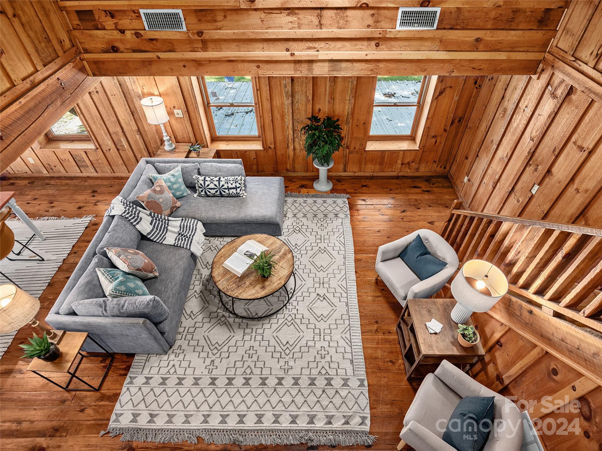 2560 King Road Pisgah Forest, NC 28768 - Photo 13 of 44 a living room with furniture and a window