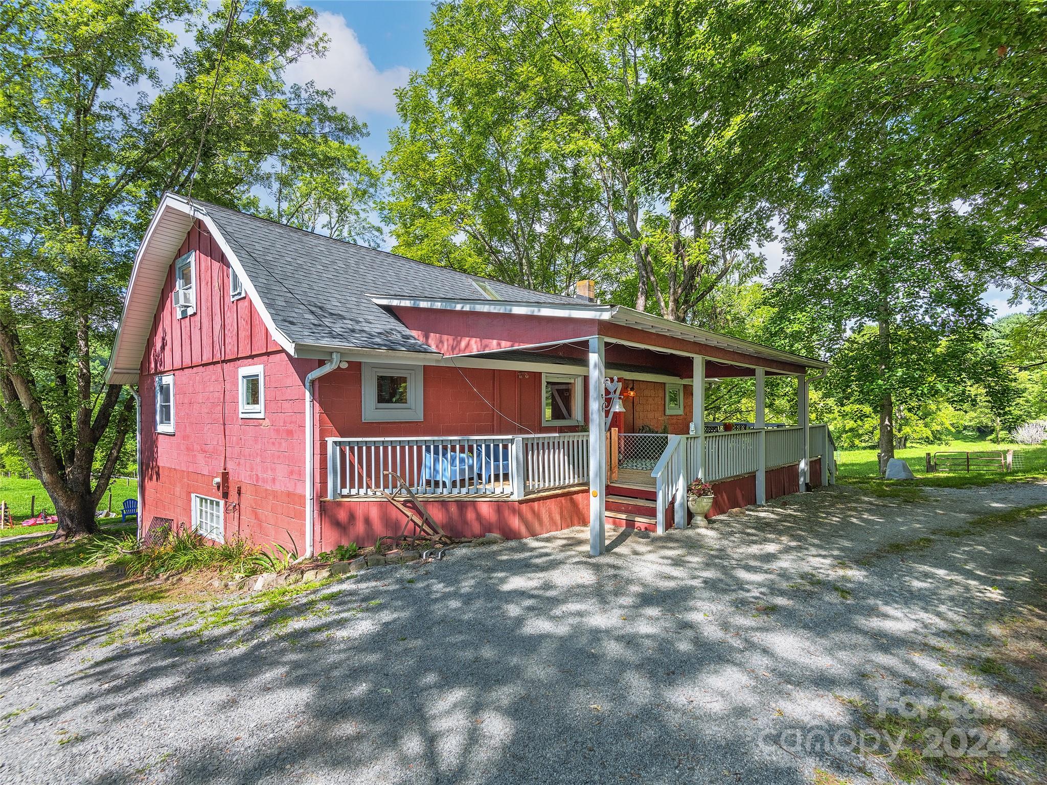 2560 King Road Pisgah Forest, NC 28768 - Photo 2 of 44 front view of a house with a yard