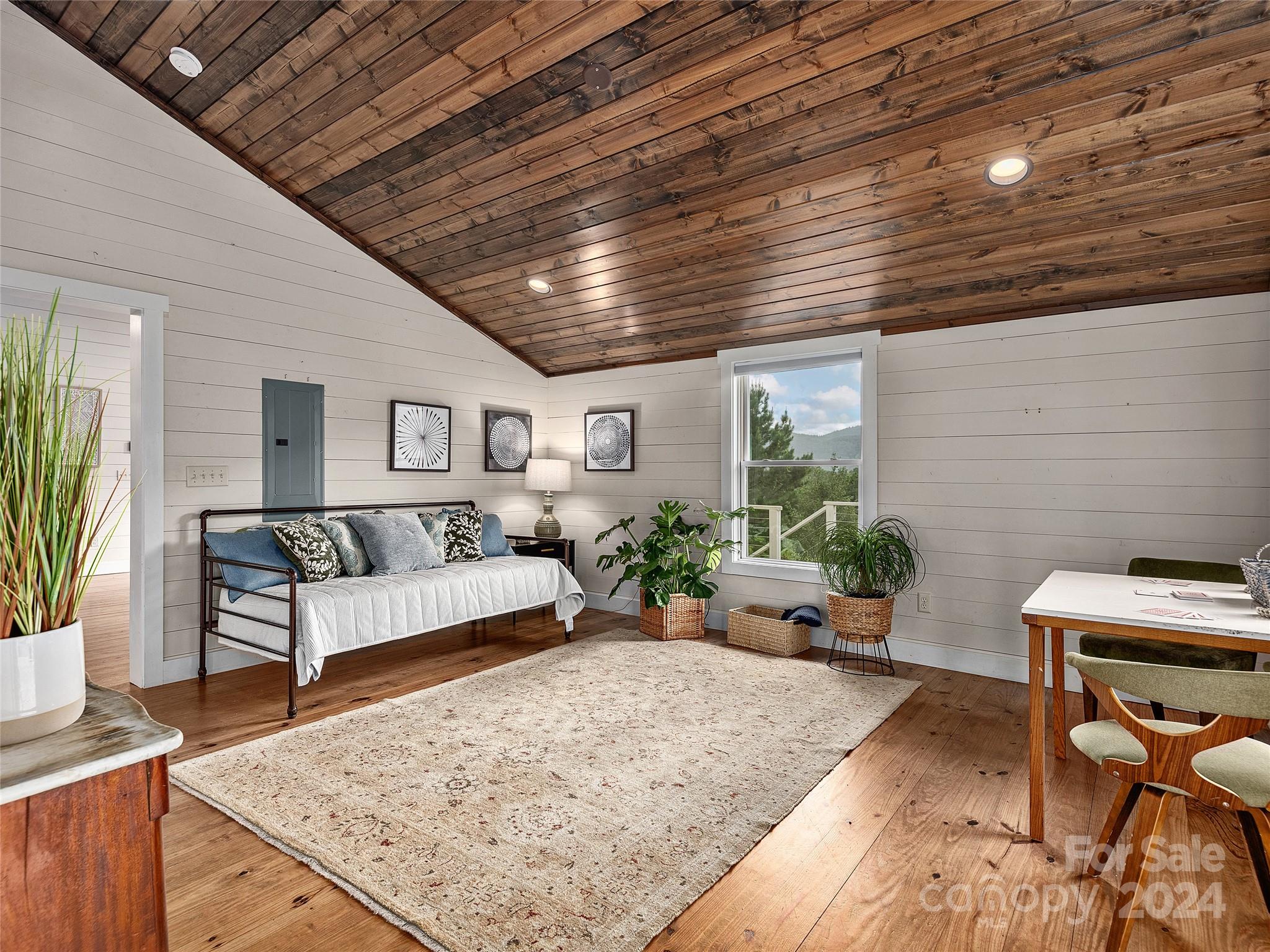 2560 King Road Pisgah Forest, NC 28768 - Photo 22 of 44 a living room with furniture and a rug