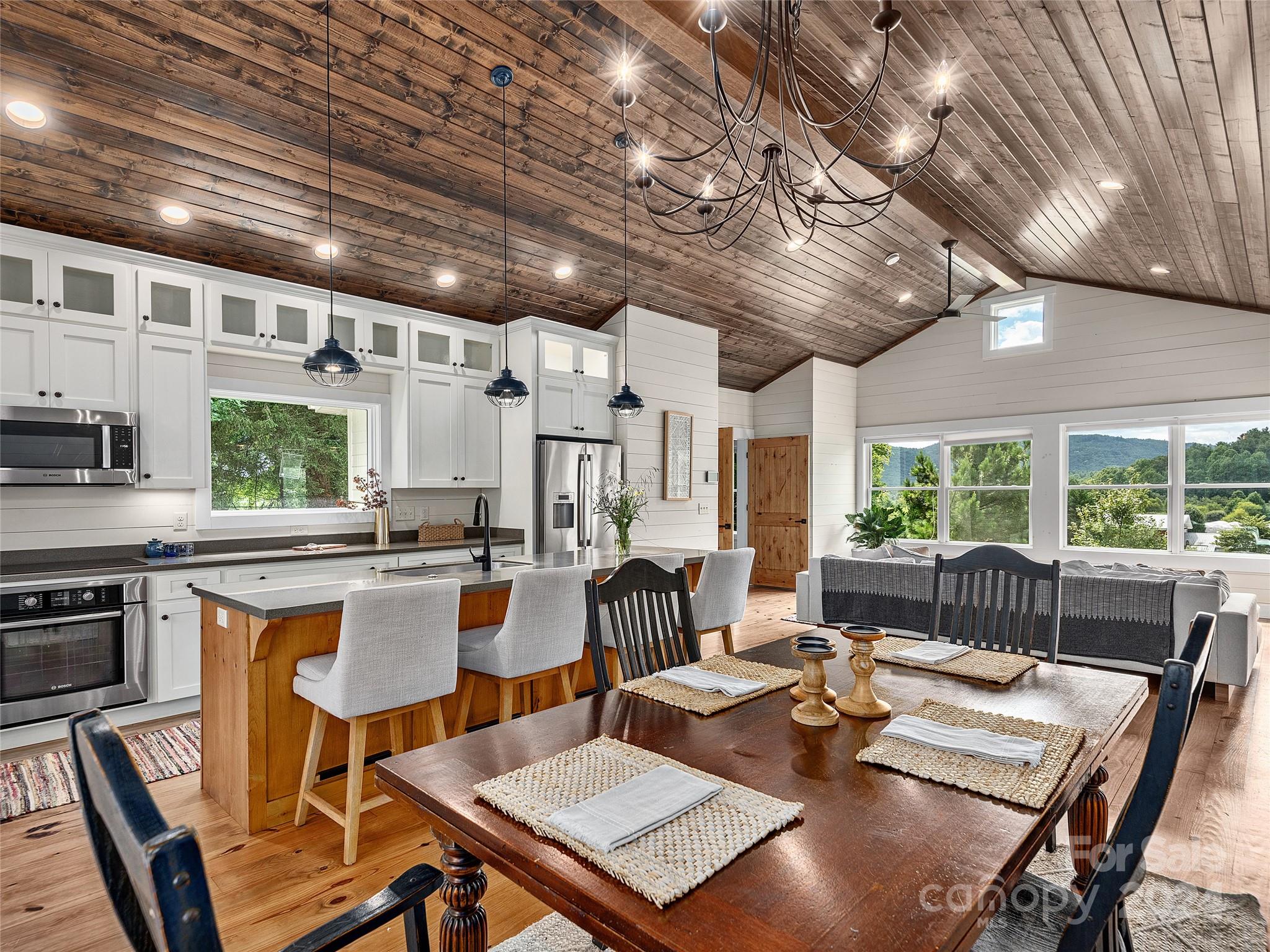 2560 King Road Pisgah Forest, NC 28768 - Photo 23 of 44 a kitchen with lots of counter top space and furniture
