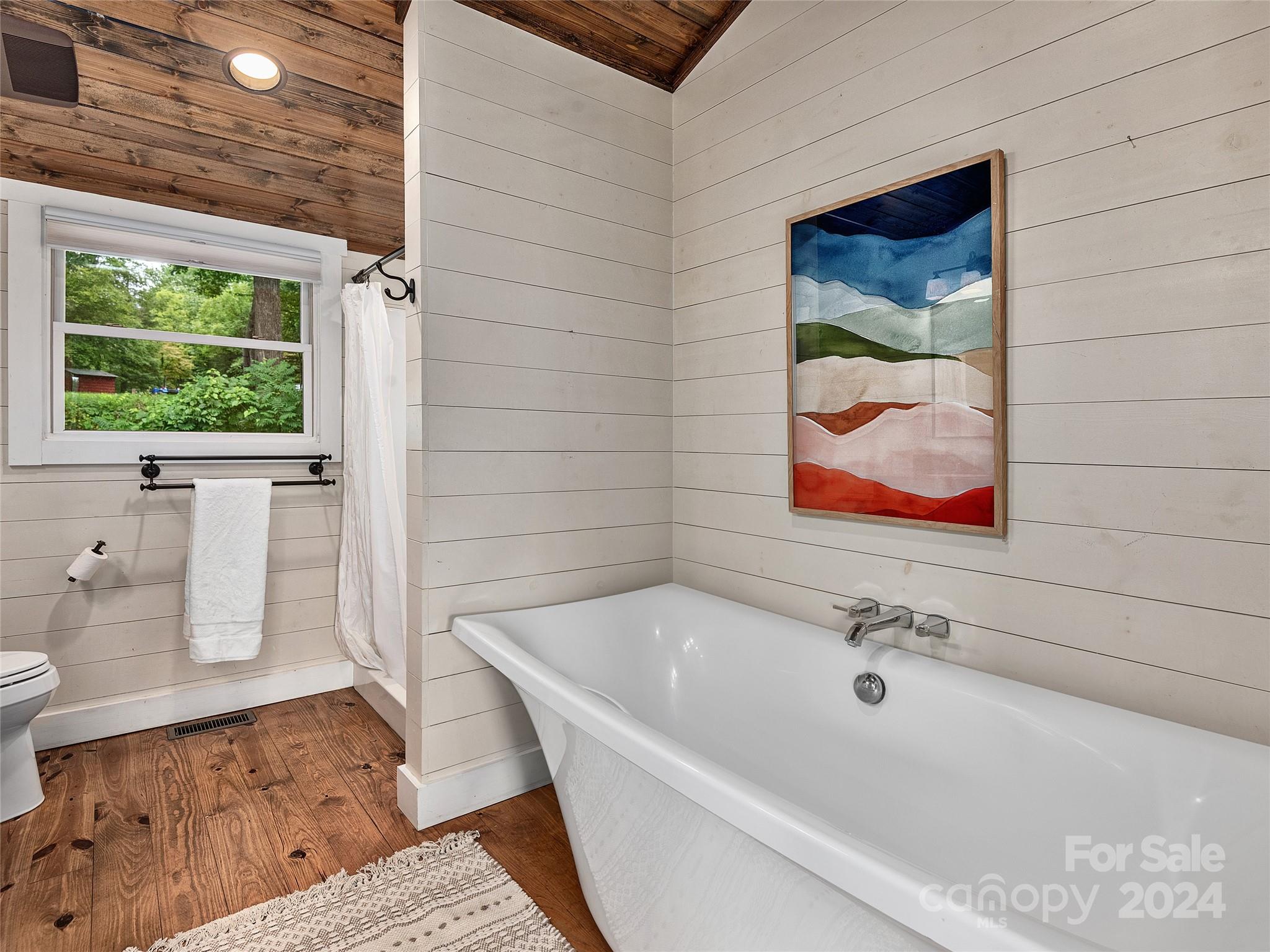 2560 King Road Pisgah Forest, NC 28768 - Photo 29 of 44 a bathroom with a tub and sink