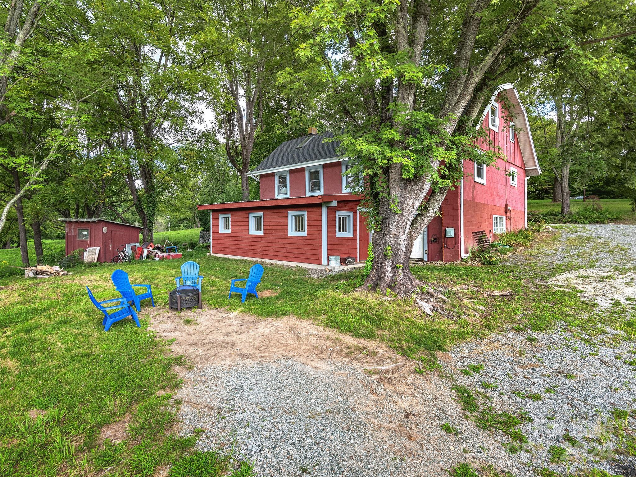 2560 King Road Pisgah Forest, NC 28768 - Photo 3 of 44 a front view of a house with swimming pool