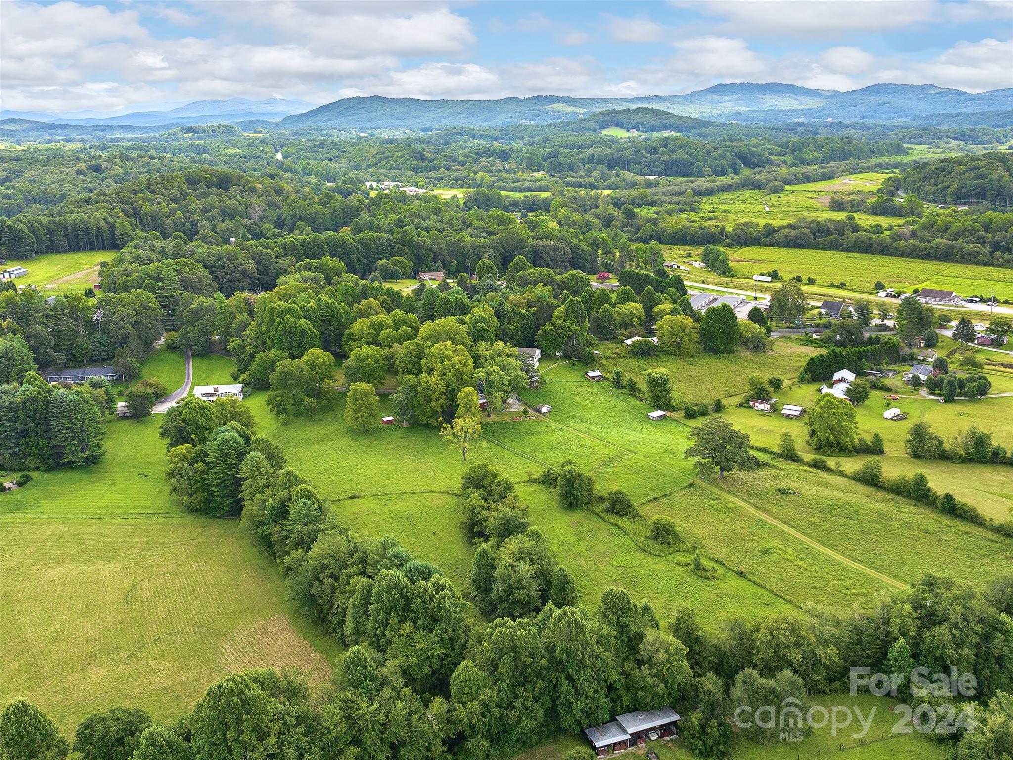 2560 King Road Pisgah Forest, NC 28768 - Photo 36 of 44 a view of a lake with a houses