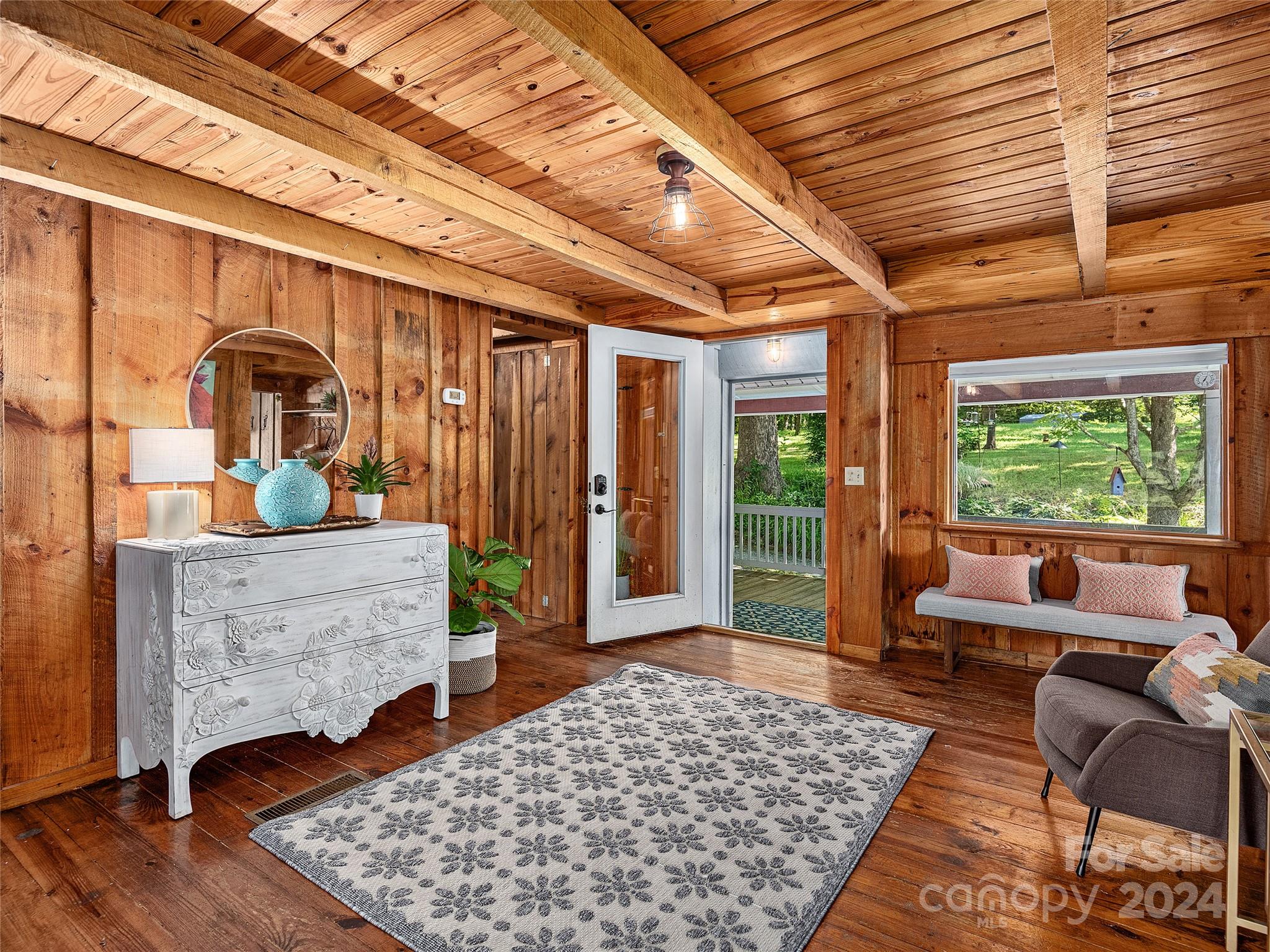 2560 King Road Pisgah Forest, NC 28768 - Photo 5 of 44 a living room with furniture and a wooden floor