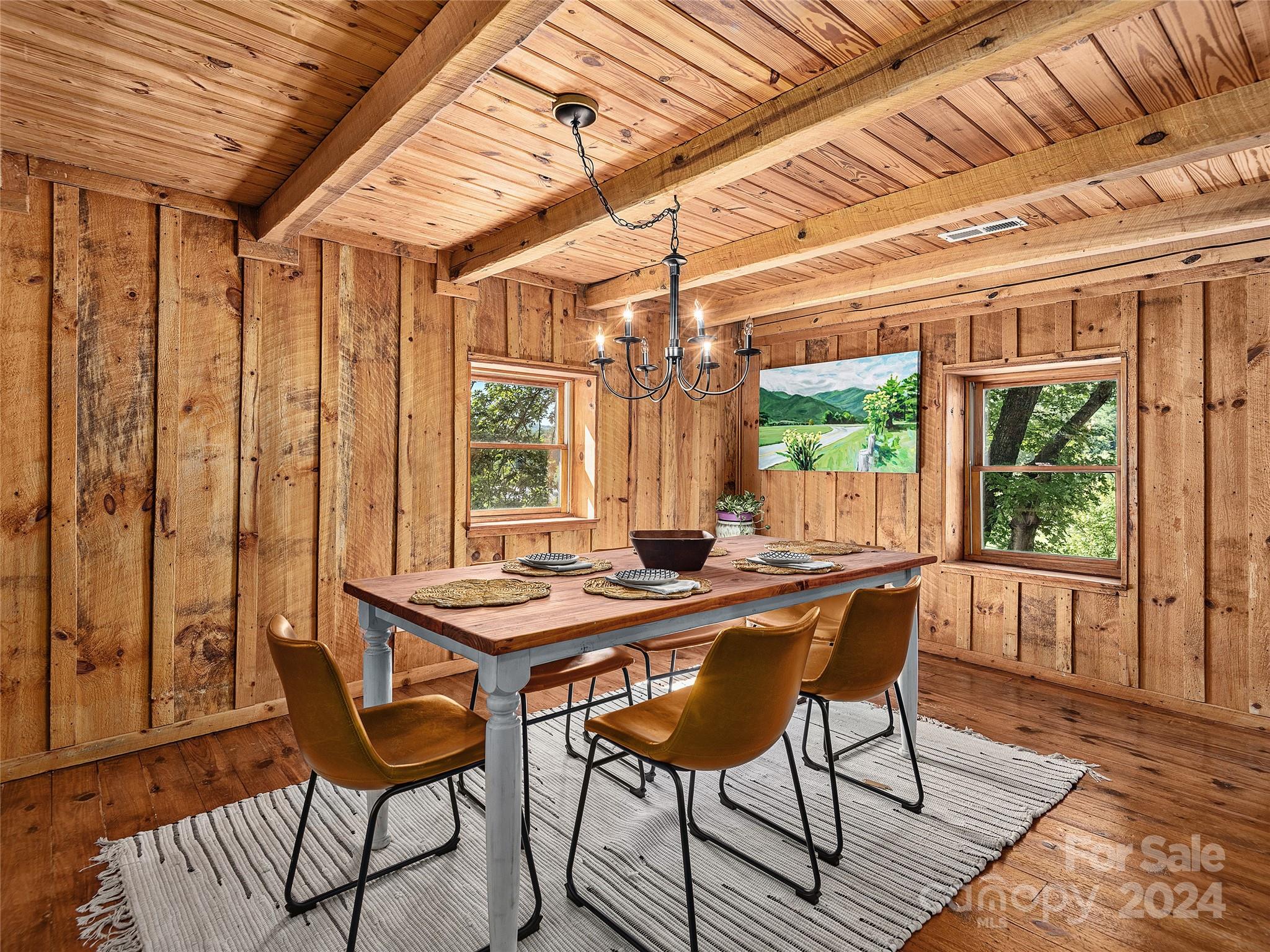 2560 King Road Pisgah Forest, NC 28768 - Photo 8 of 44 a view of a dining room with furniture window and outside view