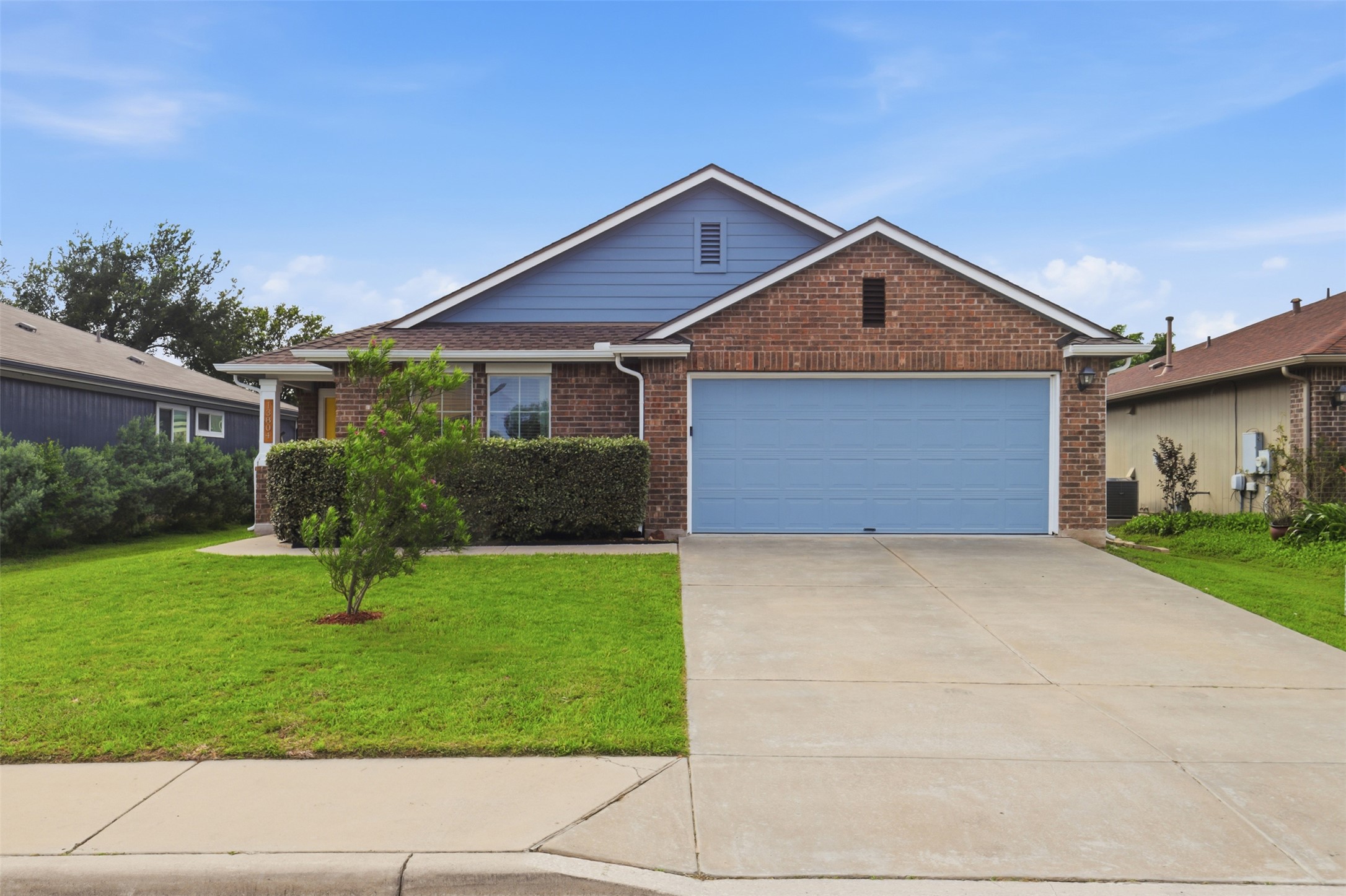 13804 Sierra Wind Lane Elgin, TX 78621 - Photo 1 of 29 a front view of house with yard and green space