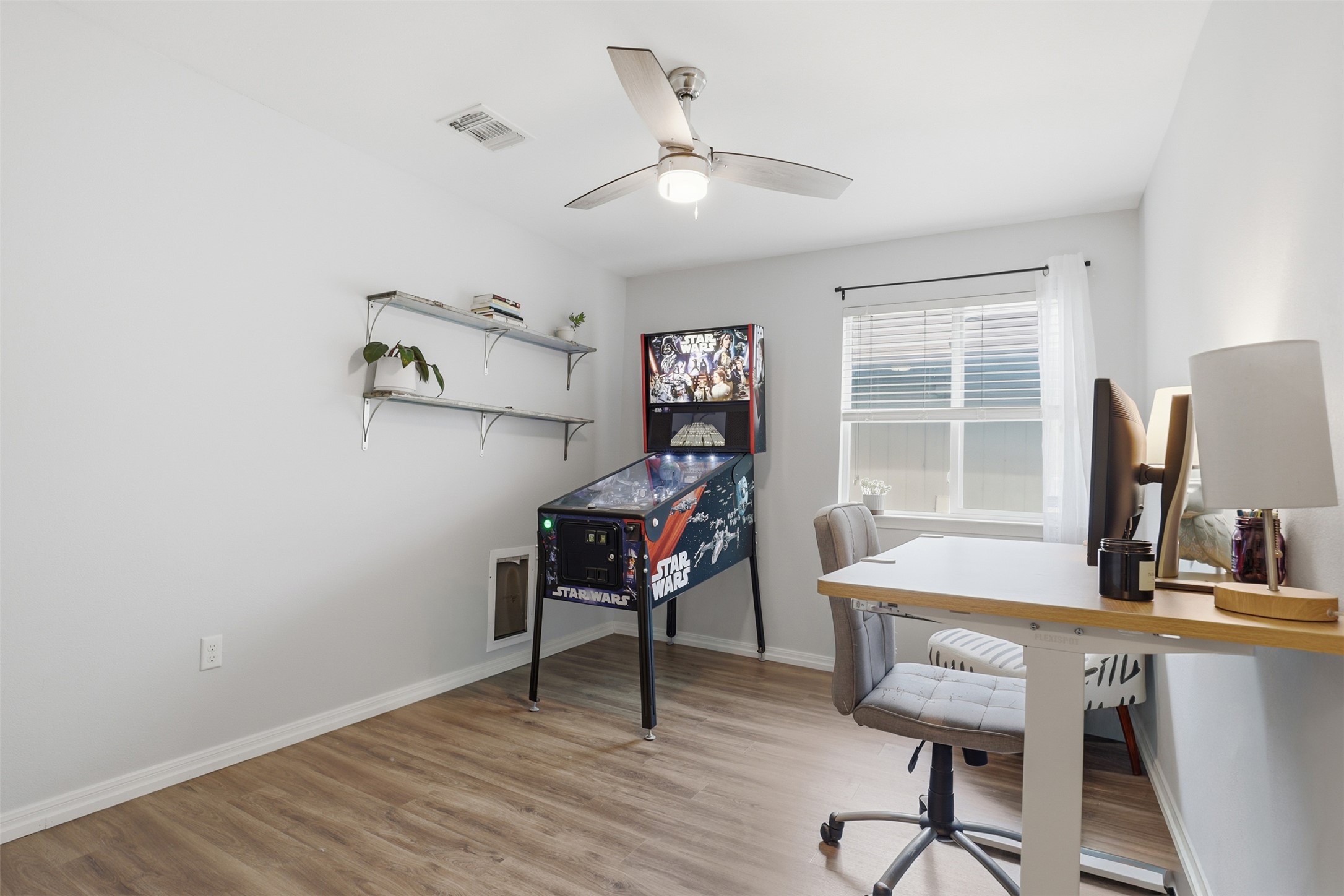 13804 Sierra Wind Lane Elgin, TX 78621 - Photo 19 of 29 a view of a workspace with furniture