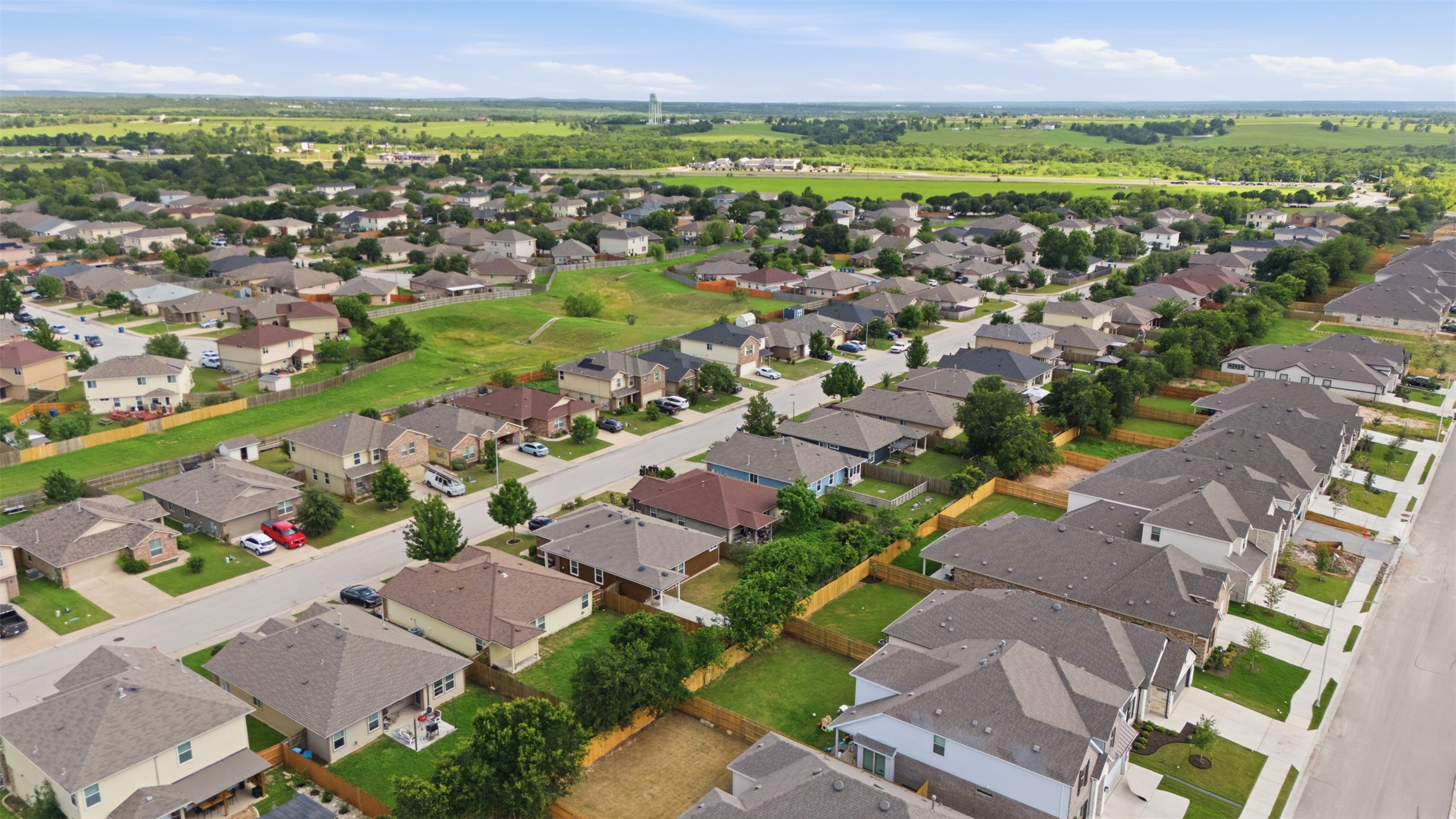 13804 Sierra Wind Lane Elgin, TX 78621 - Photo 28 of 29 an aerial view of residential houses with outdoor space