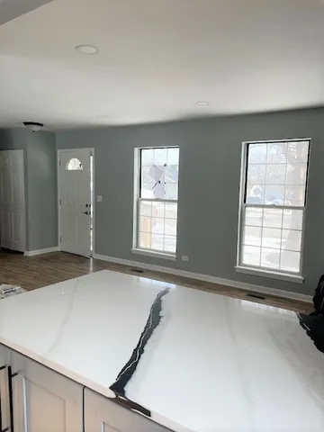 a view of an empty room and window