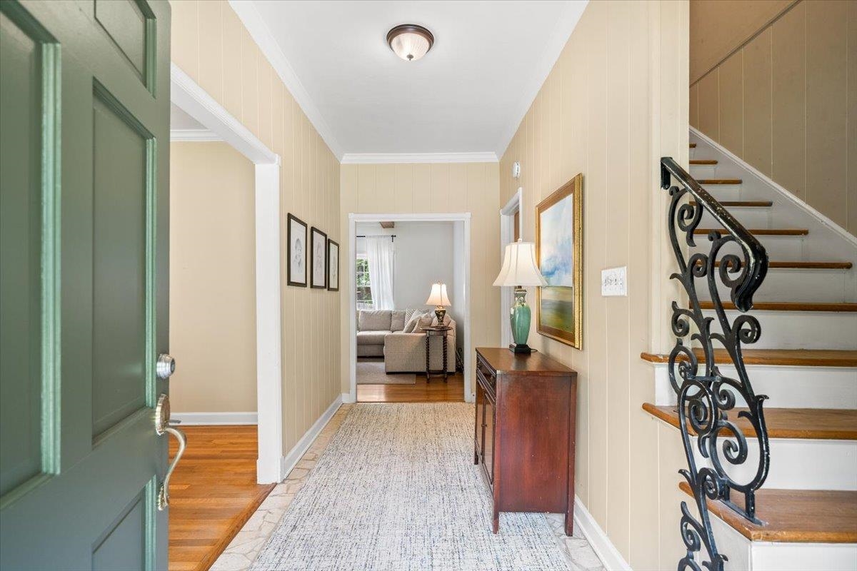 1273 Brookfield Road Memphis, TN 38119 - Photo 5 of 40 Entryway featuring a decorative wrought iron staircase railing to second floor