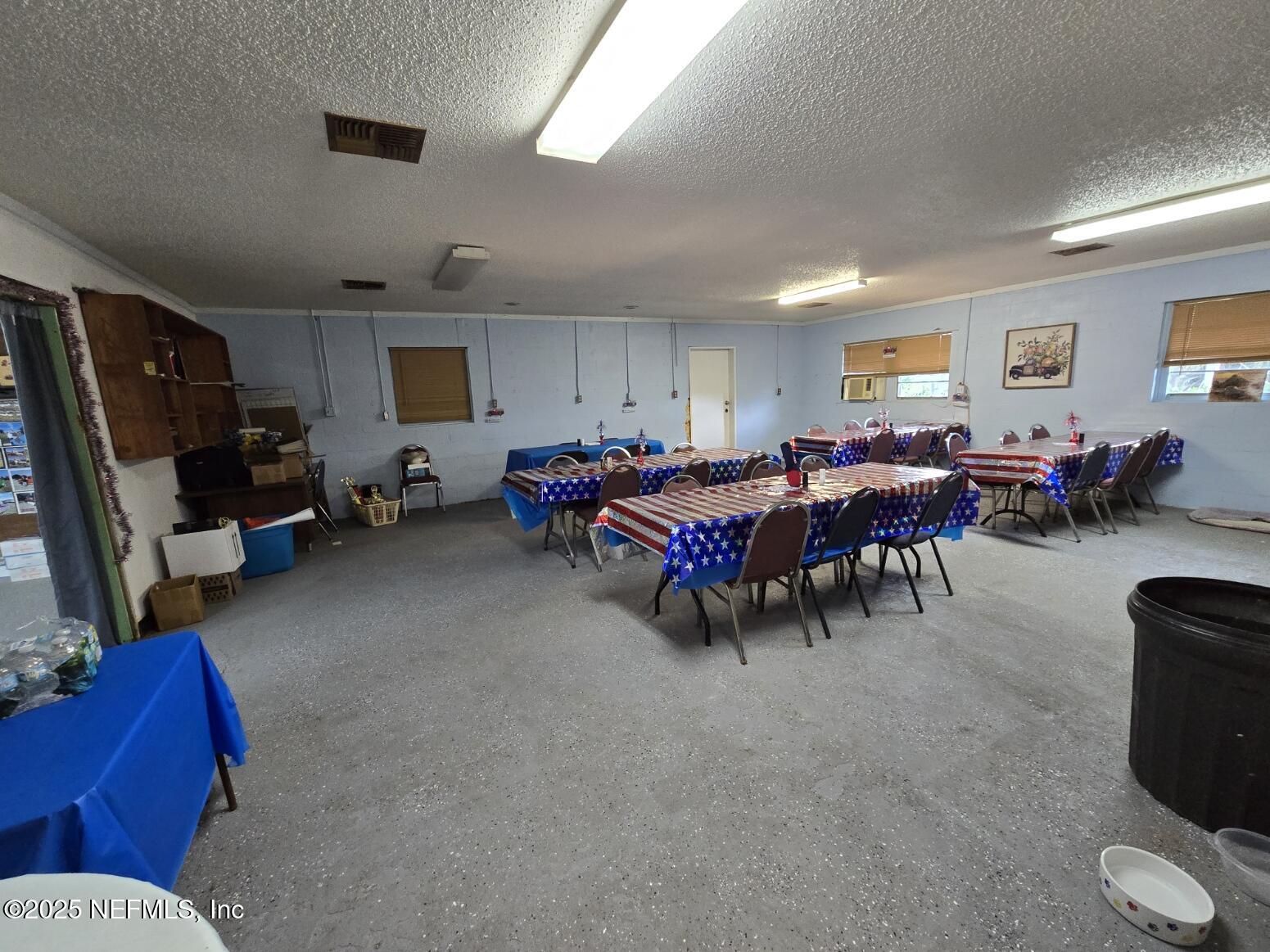 118 Yelvington Road East Palatka, FL 32131 - Photo 12 of 22 a living room with furniture and a window