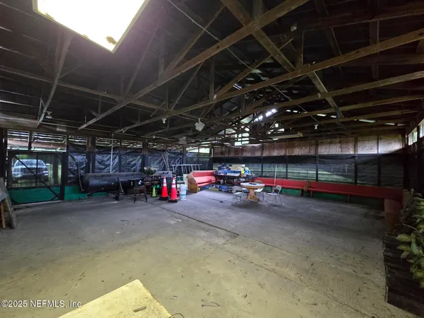 a view of empty room with storage