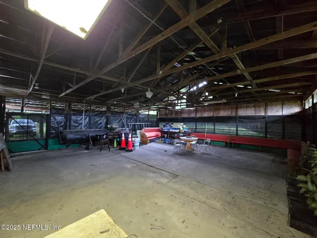 a view of empty room with storage