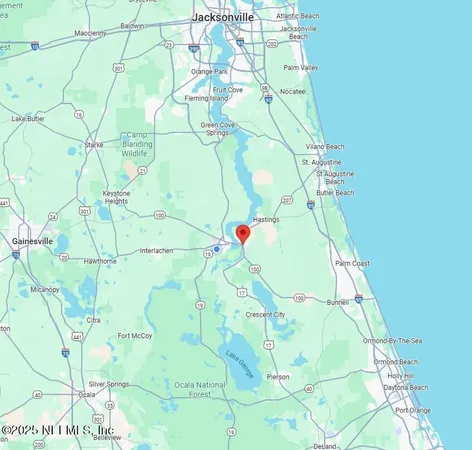 a white bath tub sitting next to a white door