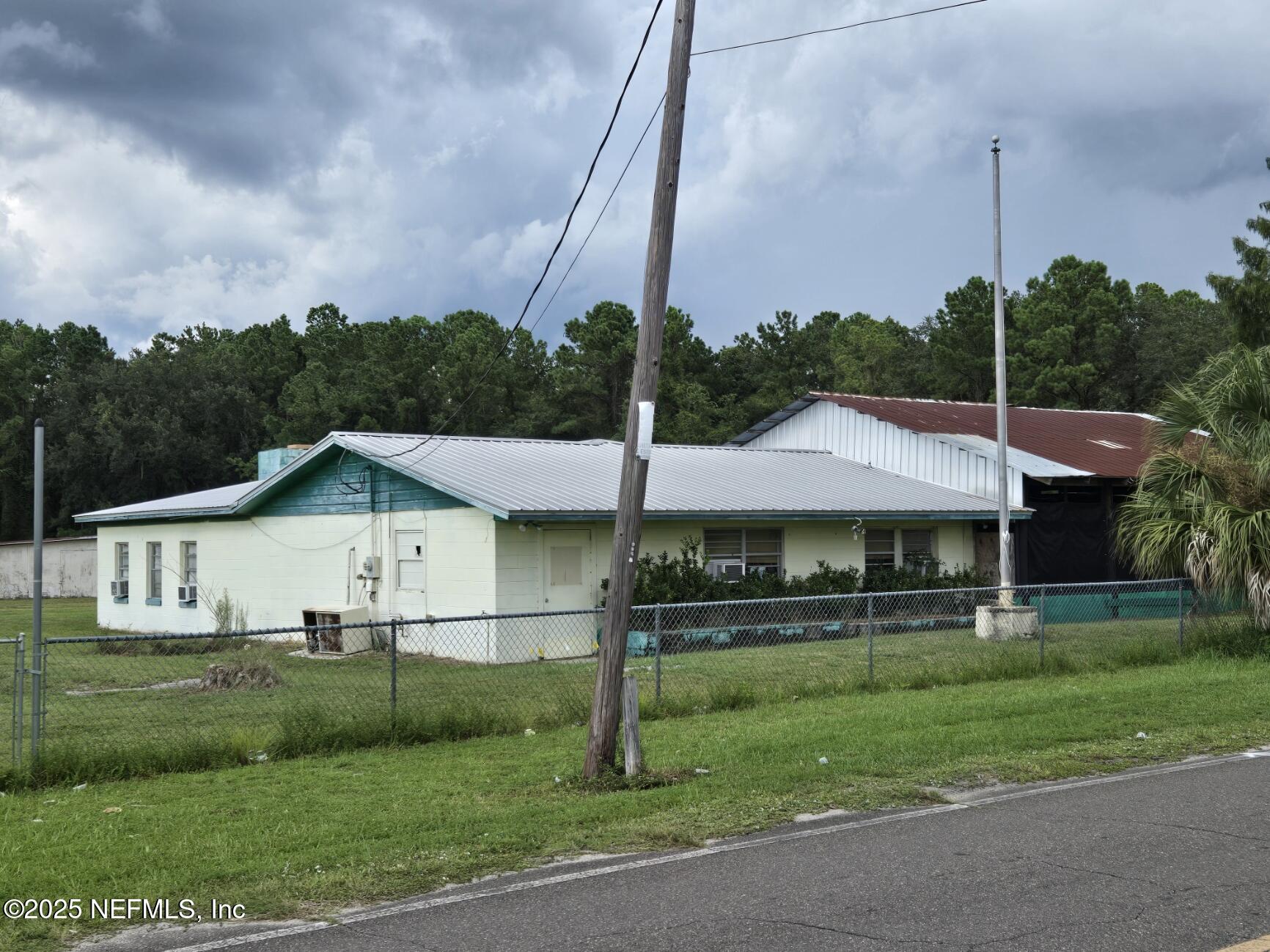 118 Yelvington Road East Palatka, FL 32131 - Photo 6 of 22 a front view of a house with a yard
