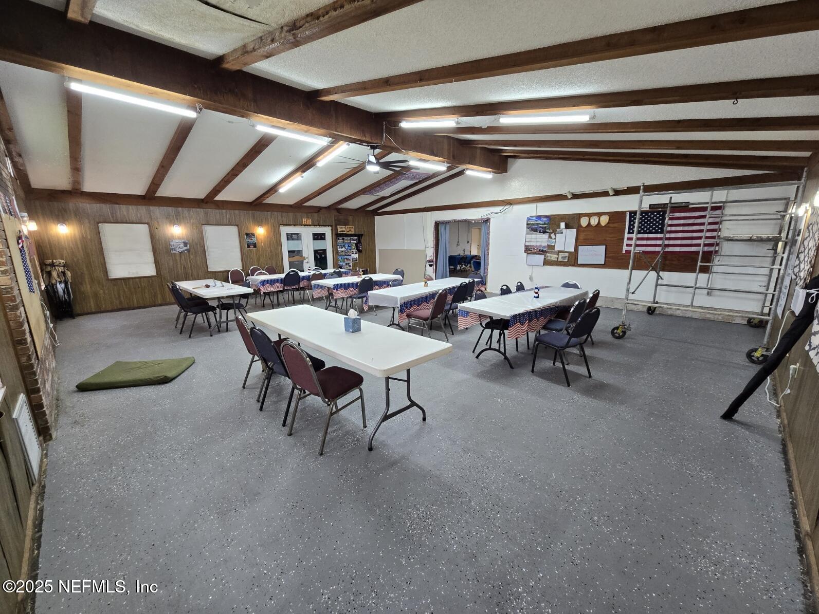 118 Yelvington Road East Palatka, FL 32131 - Photo 10 of 22 a view of a livingroom with furniture and a window