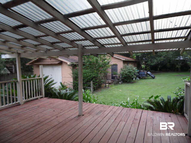 2861 Pinetucky Road Mobile, AL 36618 - Photo 14 of 20 LARGE DECK WITH VIEW OF THE GARAGE AND WORK SHOP