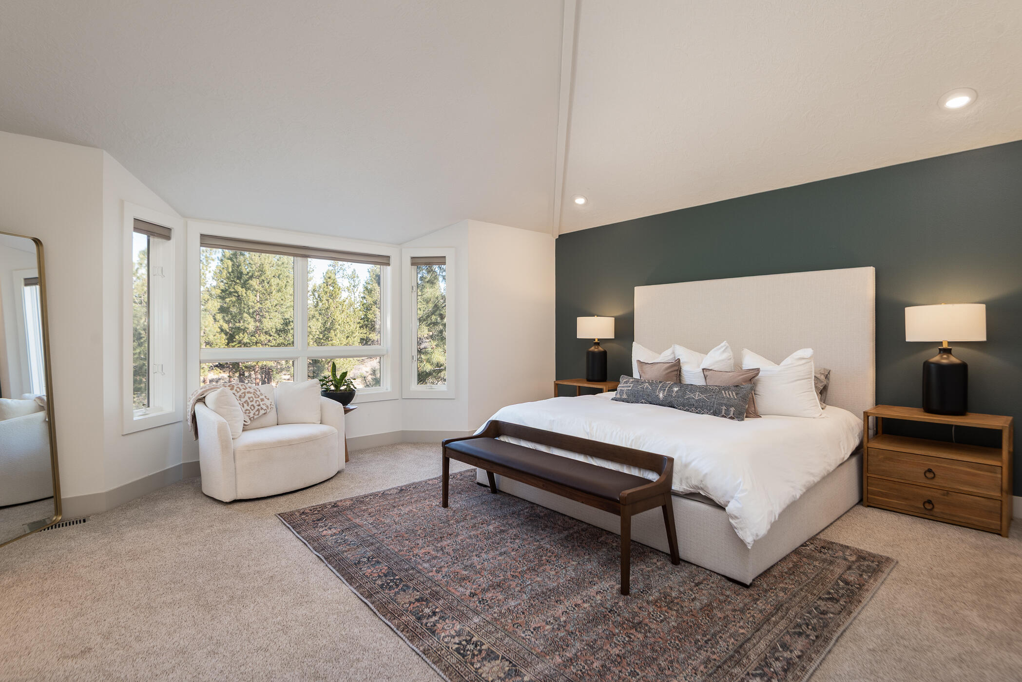 60012 West Ridgeview Drive Bend, OR 97702 - Photo 13 of 55 a bedroom with a bed and a couch