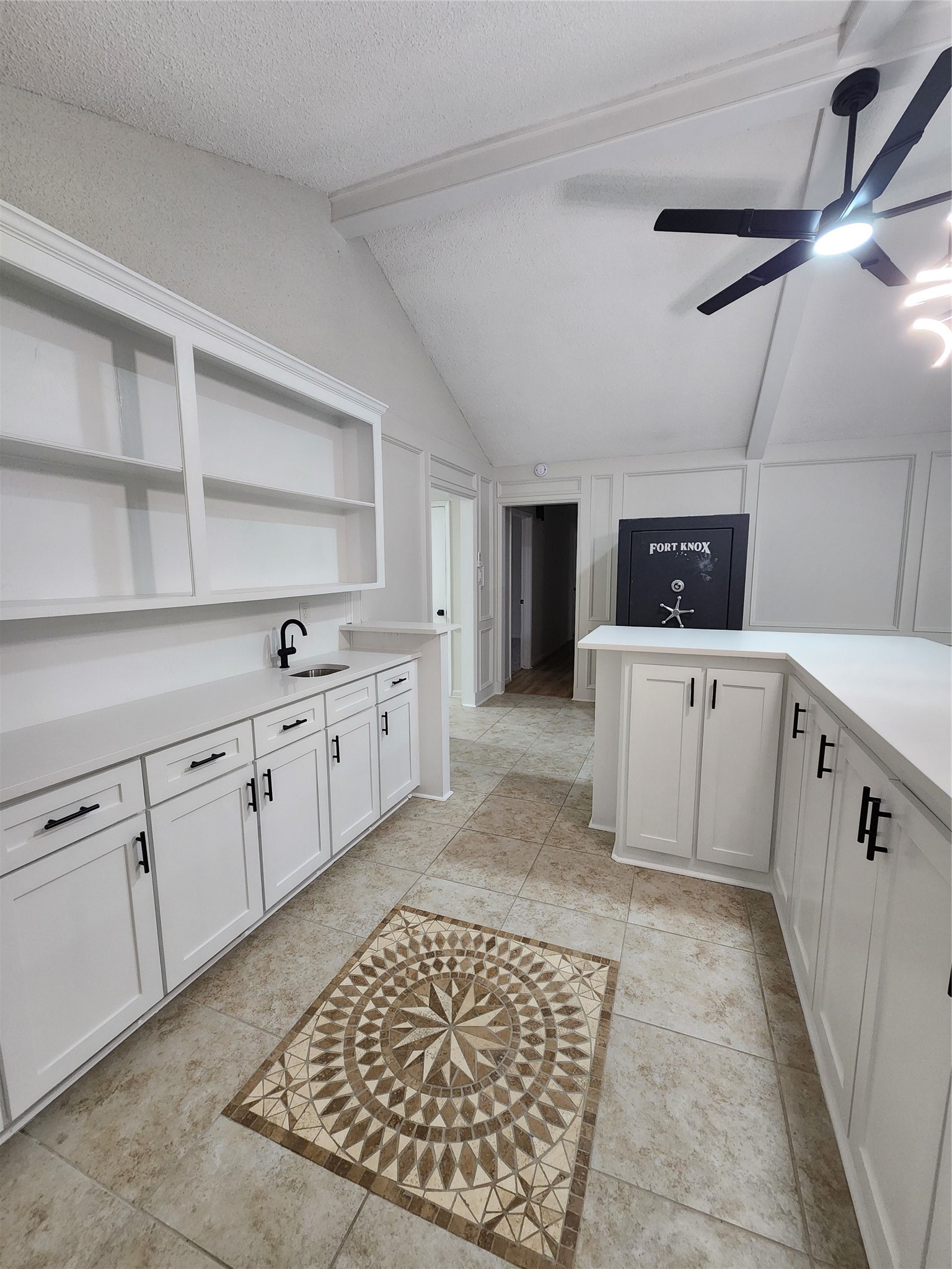 1810 State Highway 150 Coldspring, TX 77331 - Photo 13 of 28 a kitchen with a sink stove and cabinets