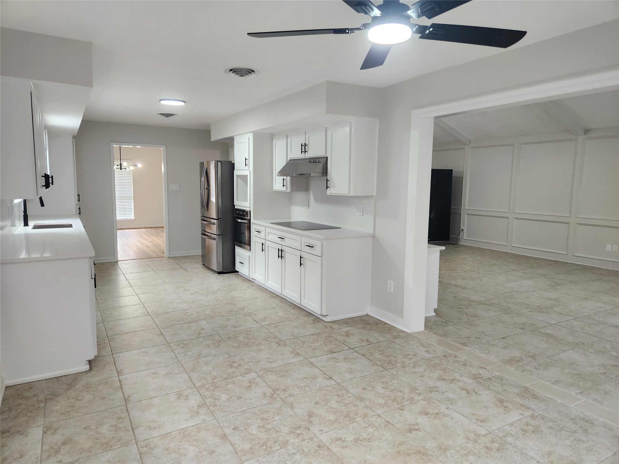 1810 State Highway 150 Coldspring, TX 77331 - Photo 15 of 28 a view of a kitchen with refrigerator and a sink