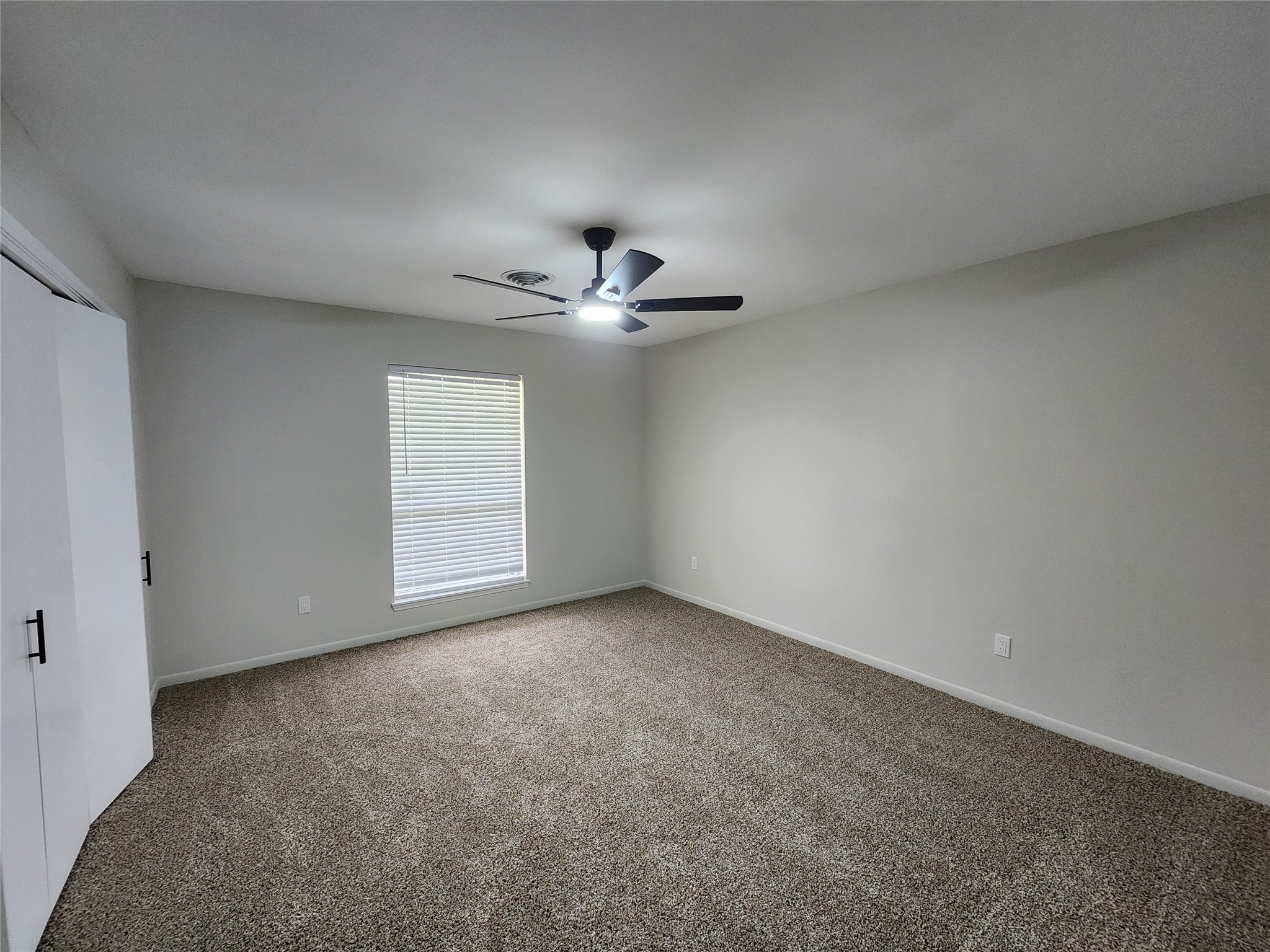 1810 State Highway 150 Coldspring, TX 77331 - Photo 18 of 28 a view of an empty room with a window