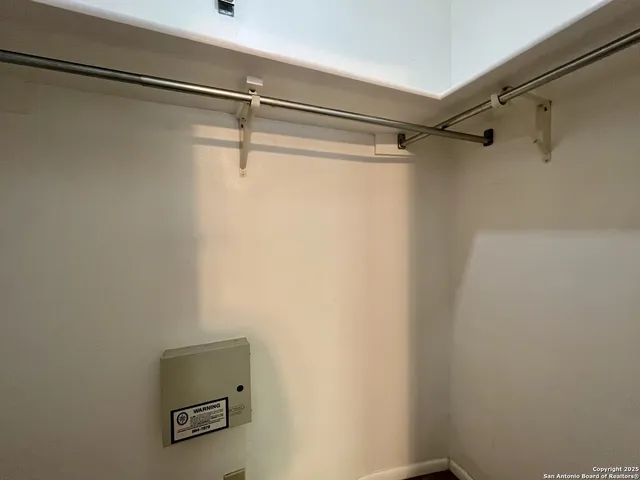 a view of a room with racks on the wall