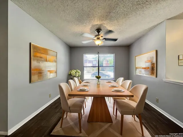 a view of a dining room with furniture window and outside view