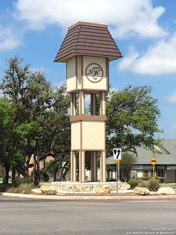a tall building with a clock on the top of it
