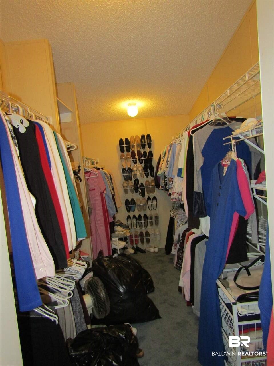 1860 Suavez Circle Lillian, AL 36549 - Photo 23 of 38 Master has a 12ft long walkin closet