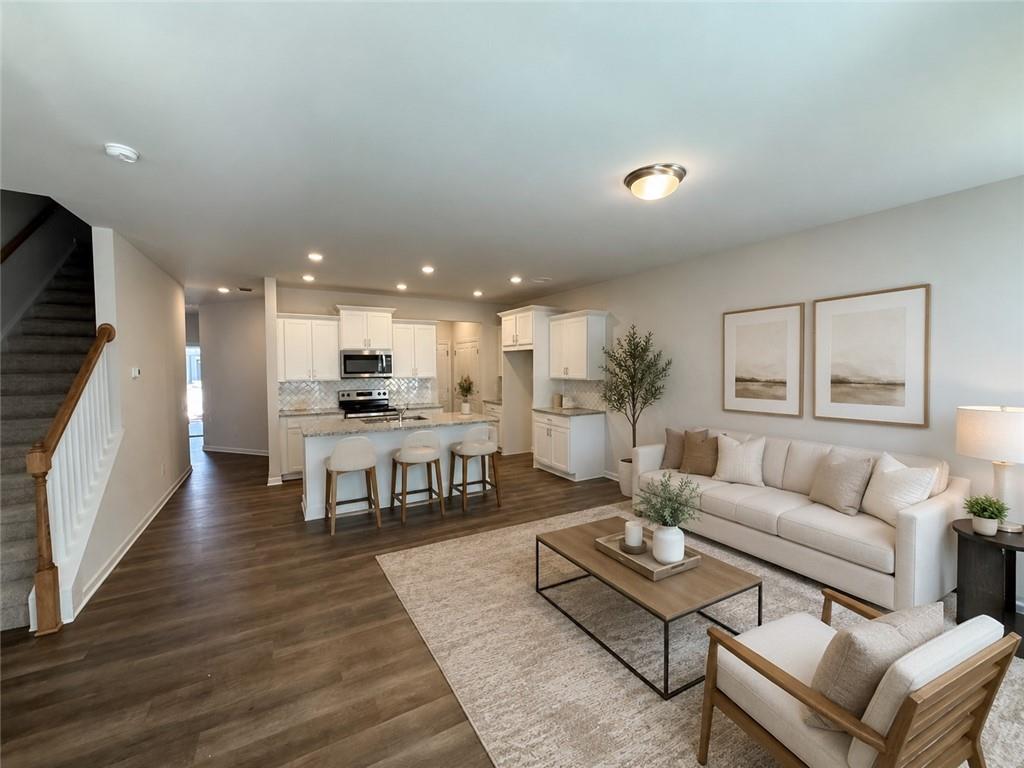 5151 Longview Run Decatur, GA 30035 - Photo 3 of 24 a living room with furniture and kitchen view