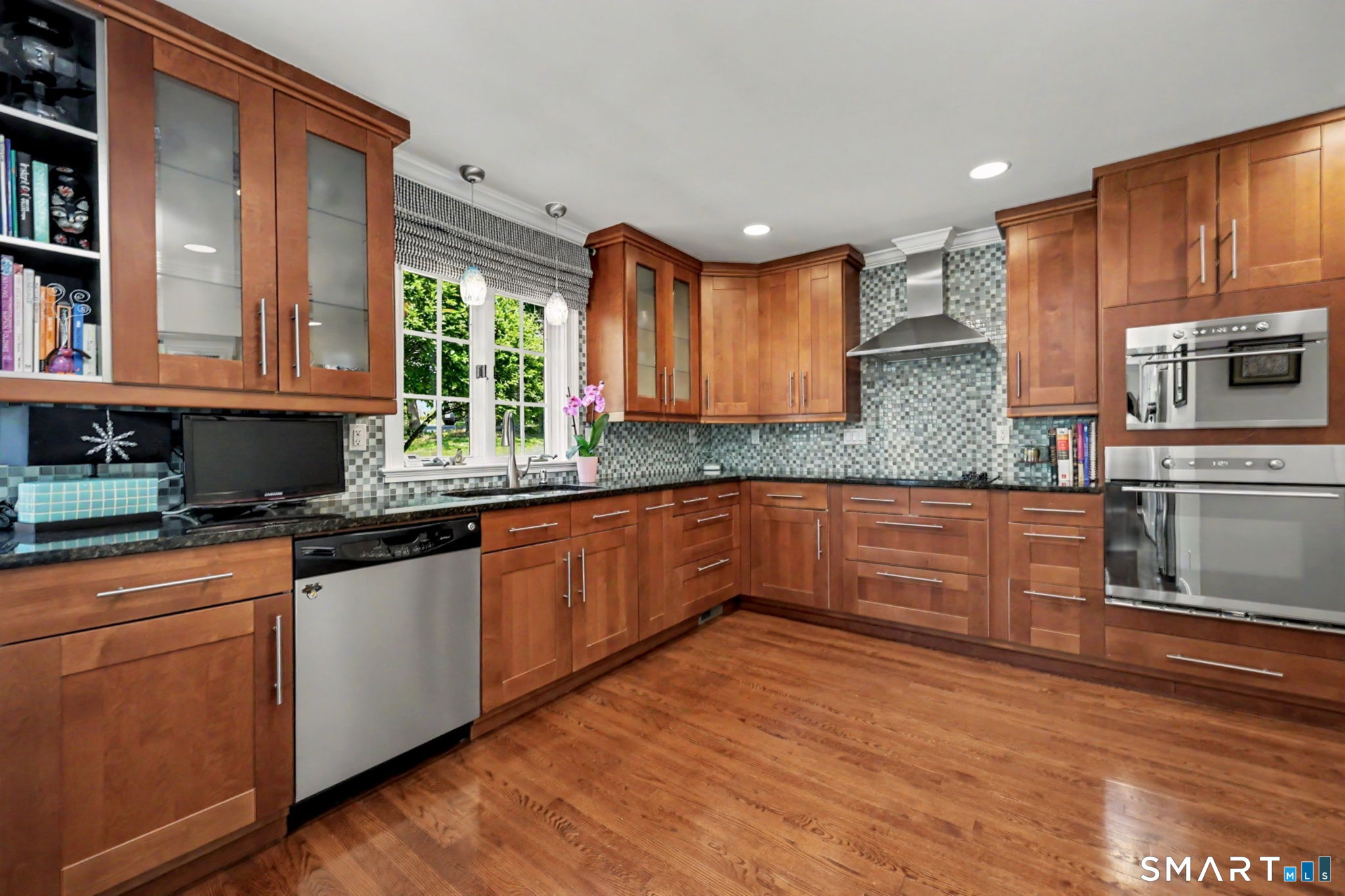 1100 Stillwater Road Stamford, CT 06902 - Photo 13 of 40 Fabulous Kitchen with cherry cabinets, black granite counter and stainless appliances