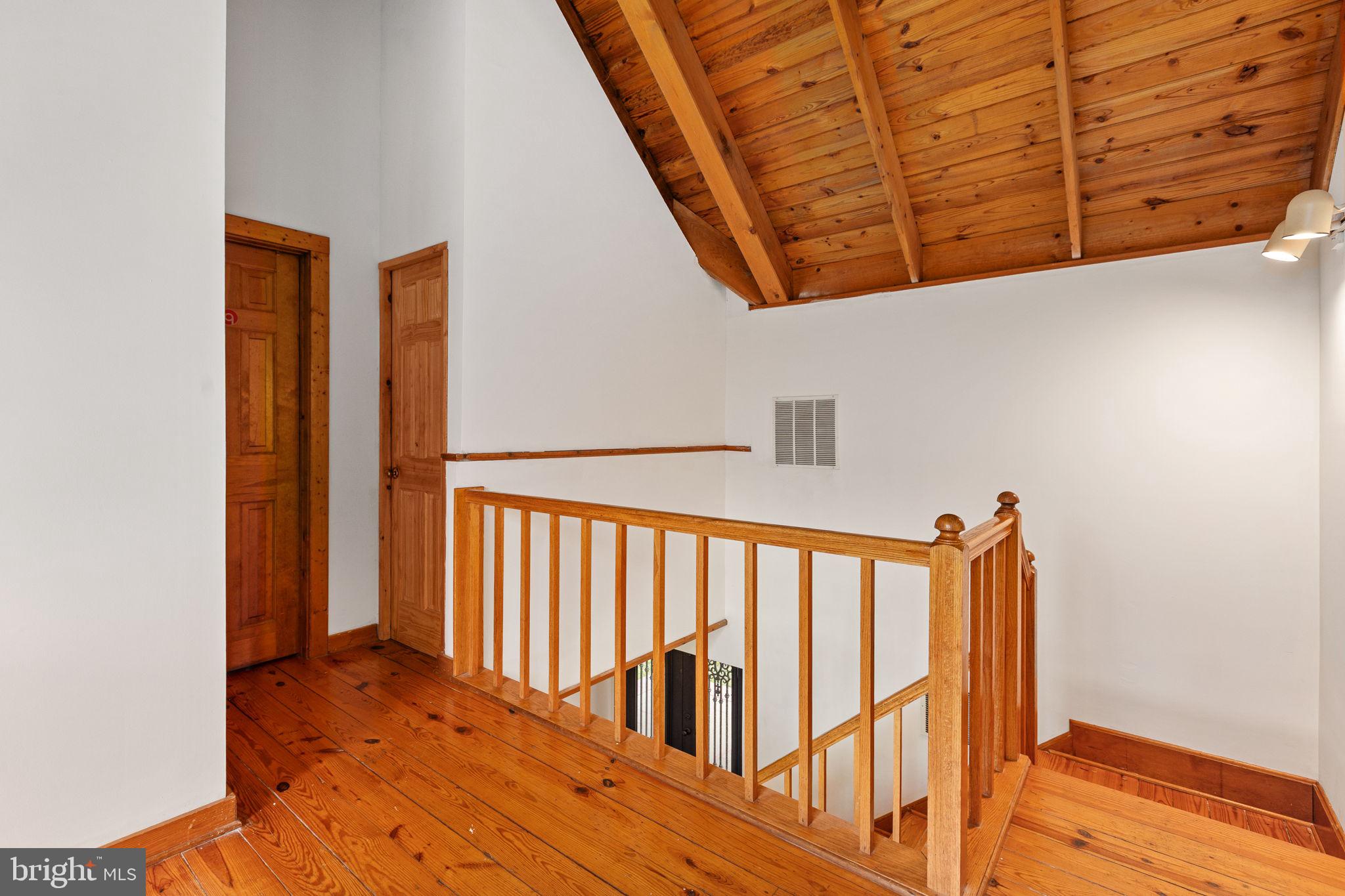 6119 Beach Road Midland, VA 22728 - Photo 51 of 98 a view of a hallway with wooden floor and entryway