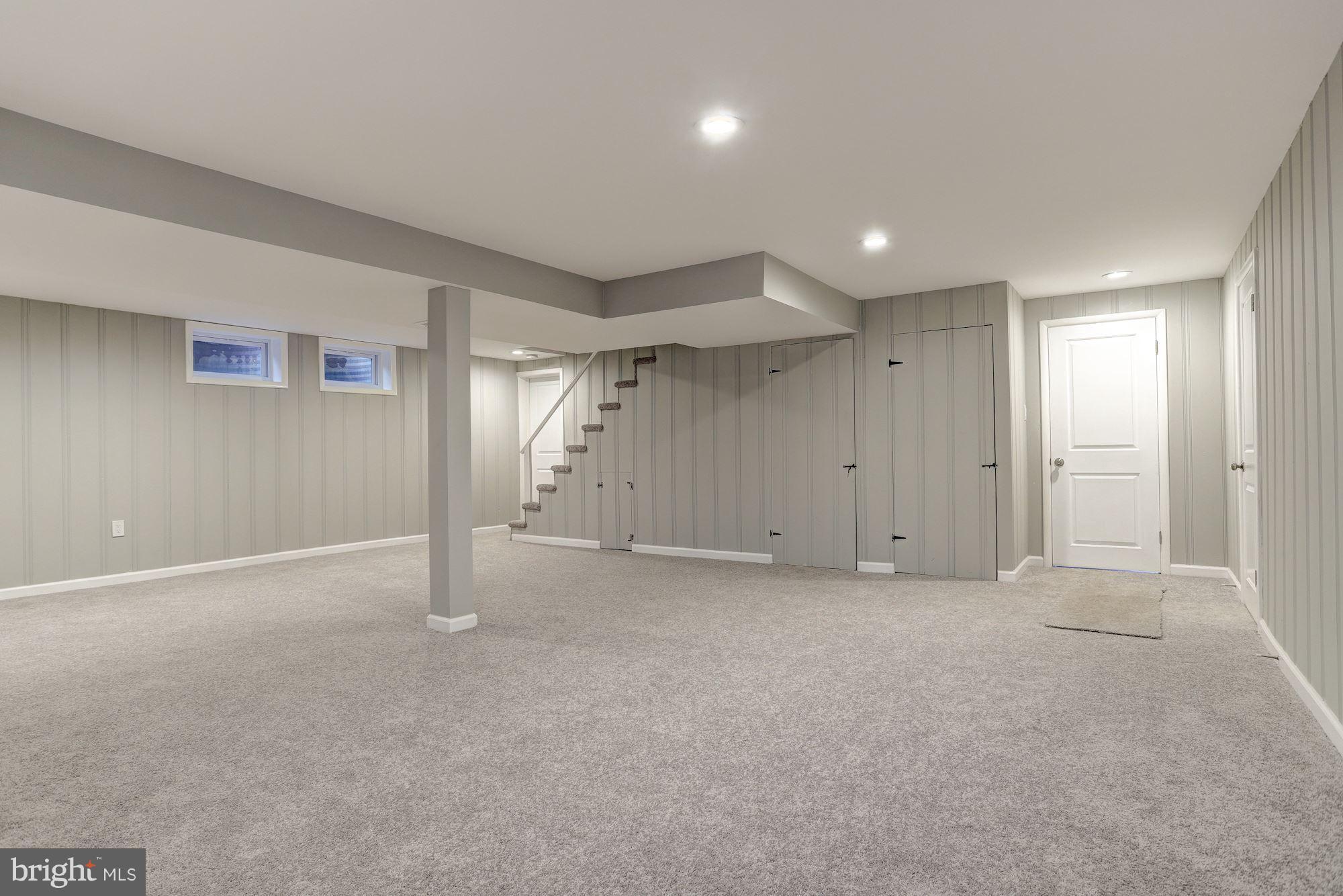 1320 Glendale Road Baltimore, MD 21239 - Photo 12 of 26 HUGE FINISHED LOWER LEVEL WITH WOOD BURNING FP