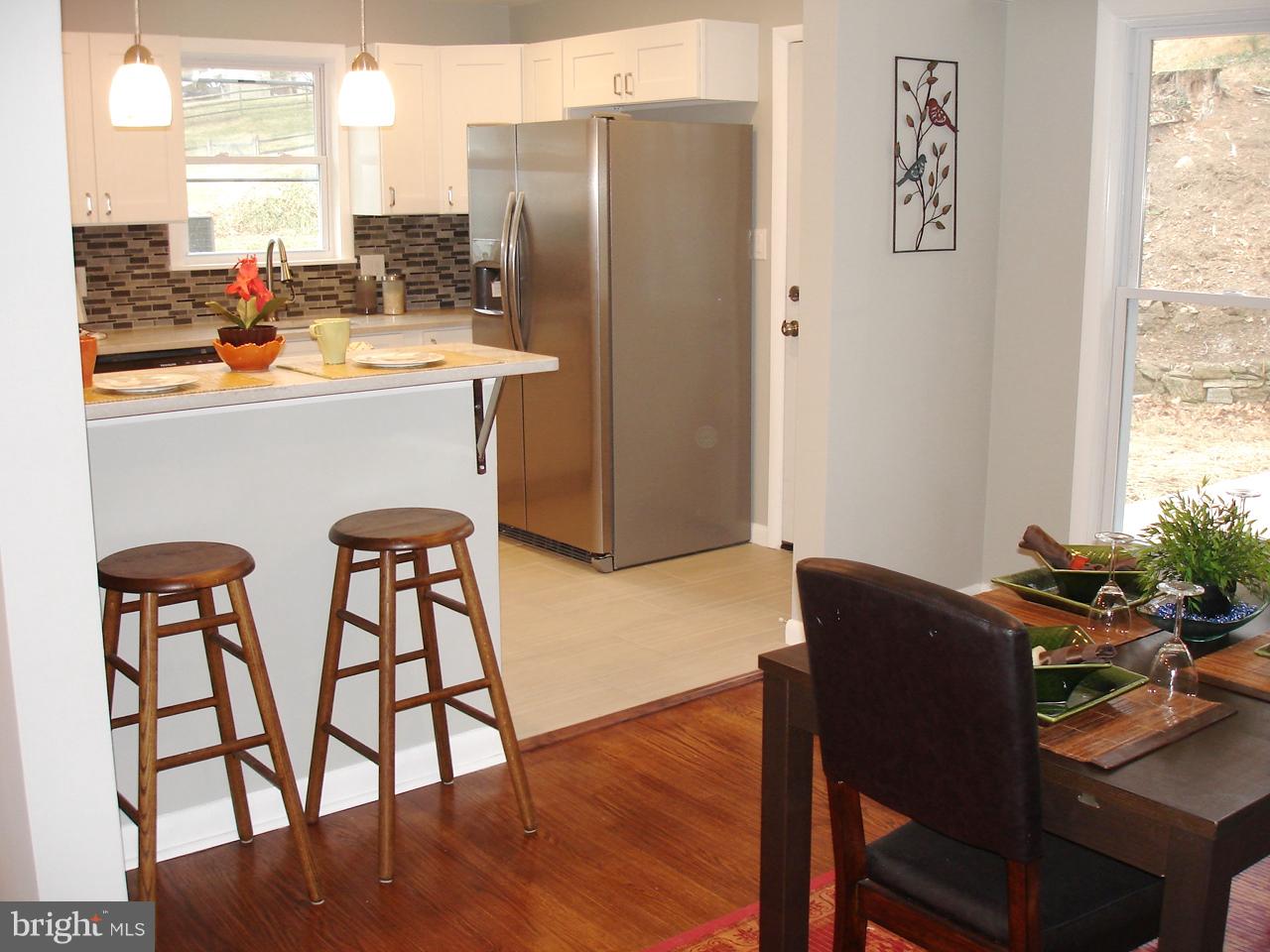 1320 Glendale Road Baltimore, MD 21239 - Photo 3 of 26 COMBINATION KITCHEN DINING SPACE + EAT -AT ISLAND