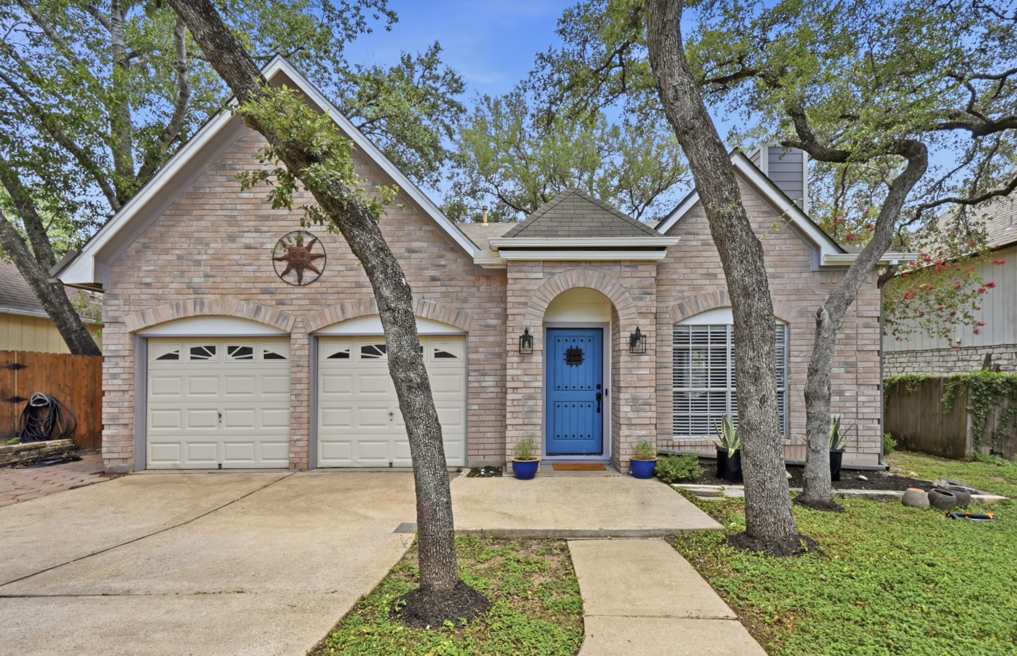 708 Shade Tree Drive Austin, TX 78748 - Photo 8 of 32 This striking two story beauty offers inviting curb appeal with striking brick masonry, a front door that pops, and beautiful shade trees.