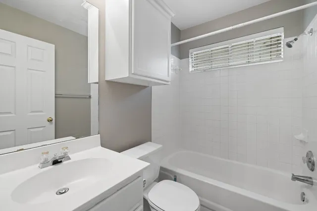 a bathroom with a sink and a bathtub