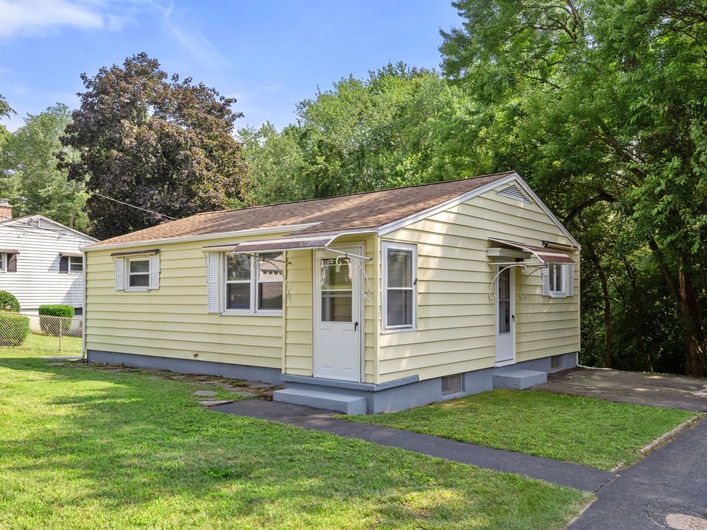 40 Dennis Street Springfield, MA 01118 - Photo 18 of 19 a view of a house with a yard