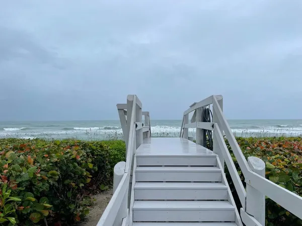 a view of balcony and ocean