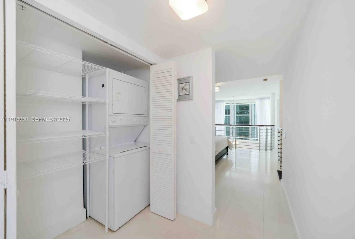 41 Southeast 5th Street, Unit 708 Miami, FL 33131 - Photo 22 of 29 a view of entryway with white walls