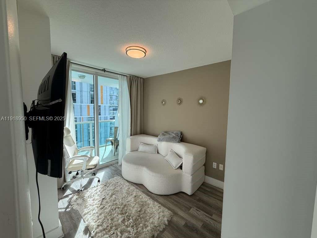 41 Southeast 5th Street, Unit 708 Miami, FL 33131 - Photo 10 of 29 a spacious bathroom with a tub and shower