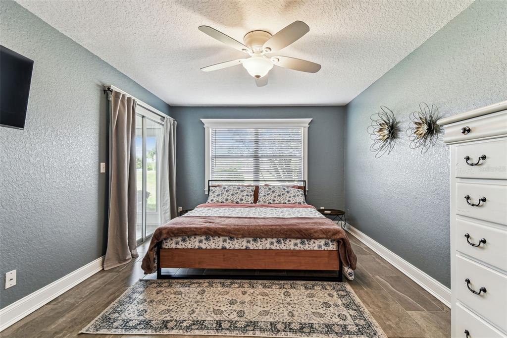 3745 Teeside Drive, Unit 3745 New Port Richey, FL 34655 - Photo 15 of 34 a bedroom with a bed and a window