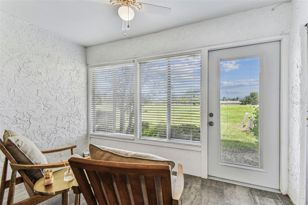3745 Teeside Drive, Unit 3745 New Port Richey, FL 34655 - Photo 20 of 34 a living room with furniture and a window