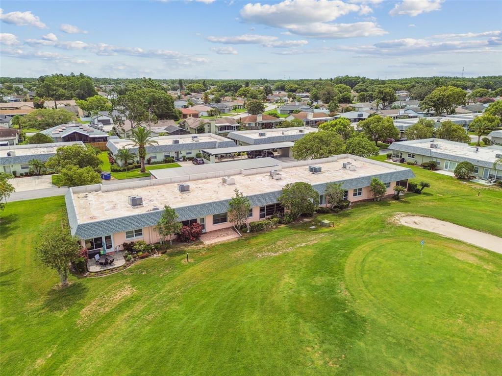 3745 Teeside Drive, Unit 3745 New Port Richey, FL 34655 - Photo 28 of 34 a view of a city with tall buildings in the background