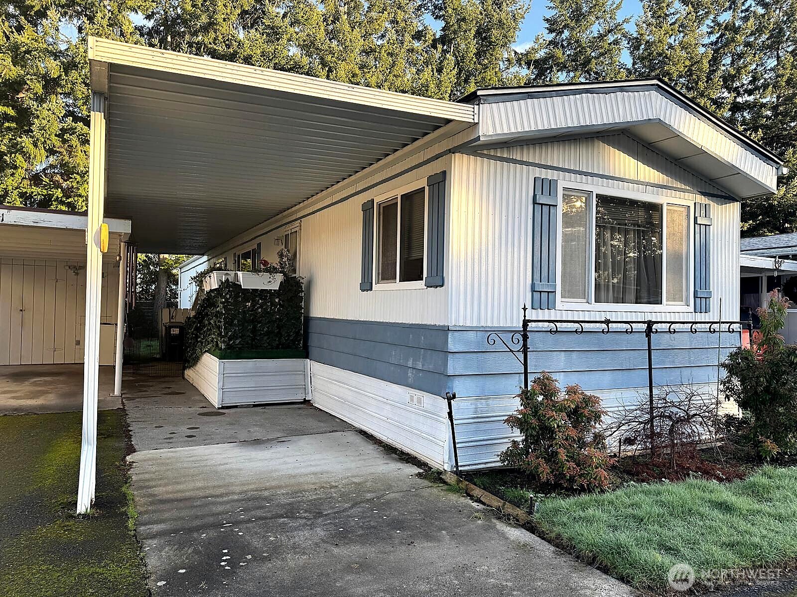 2210 Old Highway 99 South Road, Unit 31 Mount Vernon, WA 98273 - Photo 19 of 23 a view of a house with backyard and sitting area