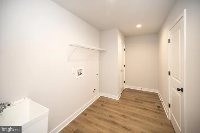 a view of bathroom with a sink and a shower
