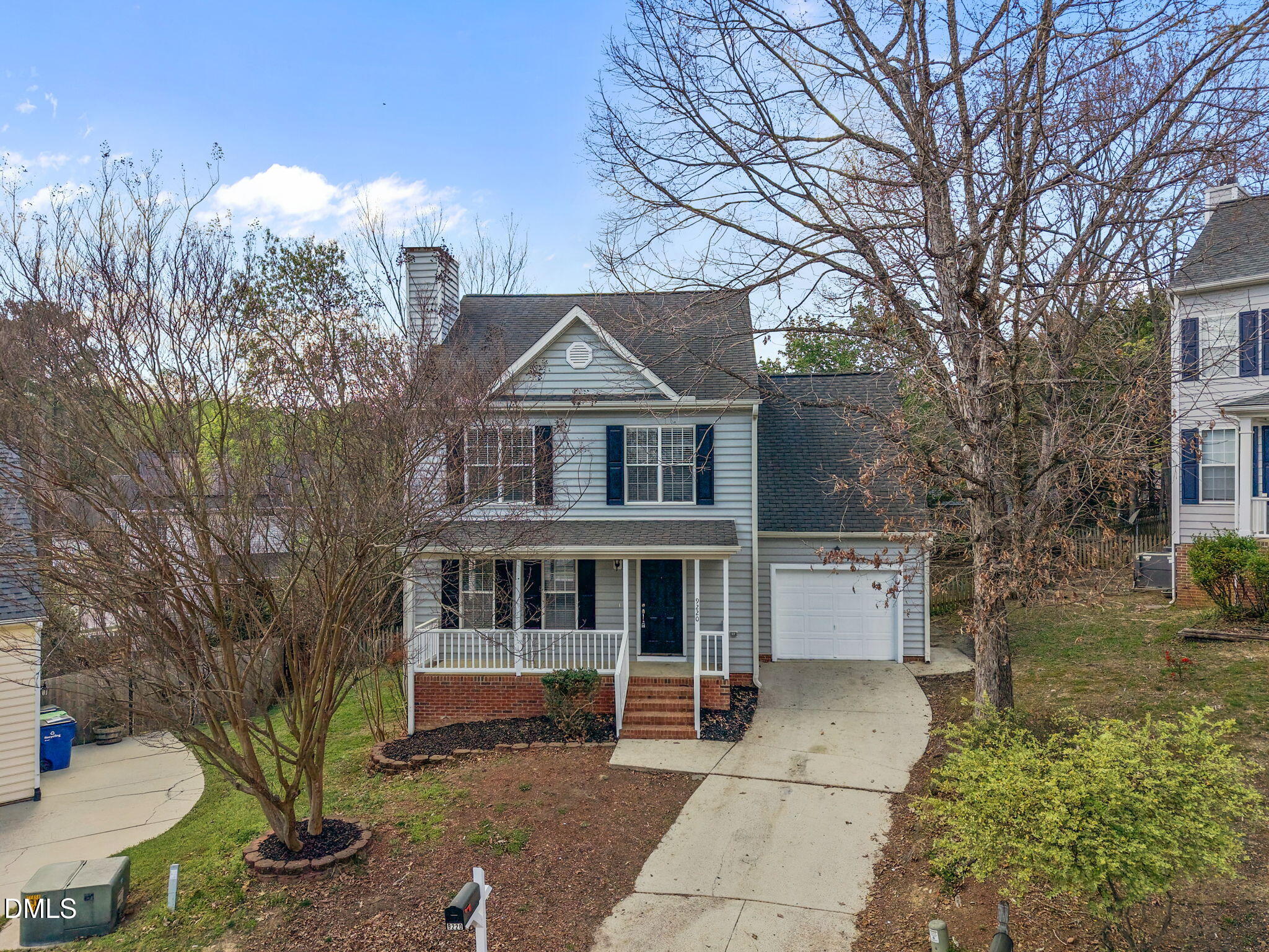 9220 Pennythorne Court Raleigh, NC 27615 - Photo 9 of 49 a front view of a house with a yard