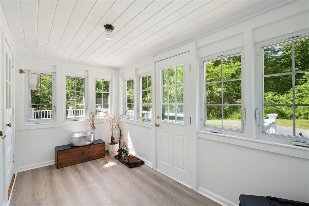 156 Langen Road Lancaster, MA 01523 - Photo 4 of 26 a living room with furniture and windows