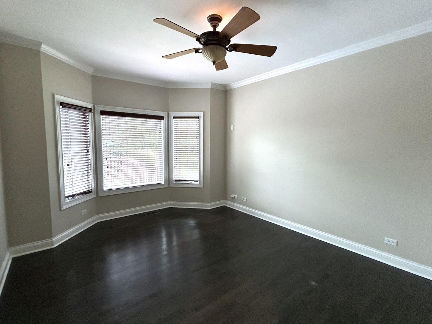 3932 Bluejay Lane Naperville, IL 60564 - Photo 18 of 50 a view of an empty room with window and wooden floor