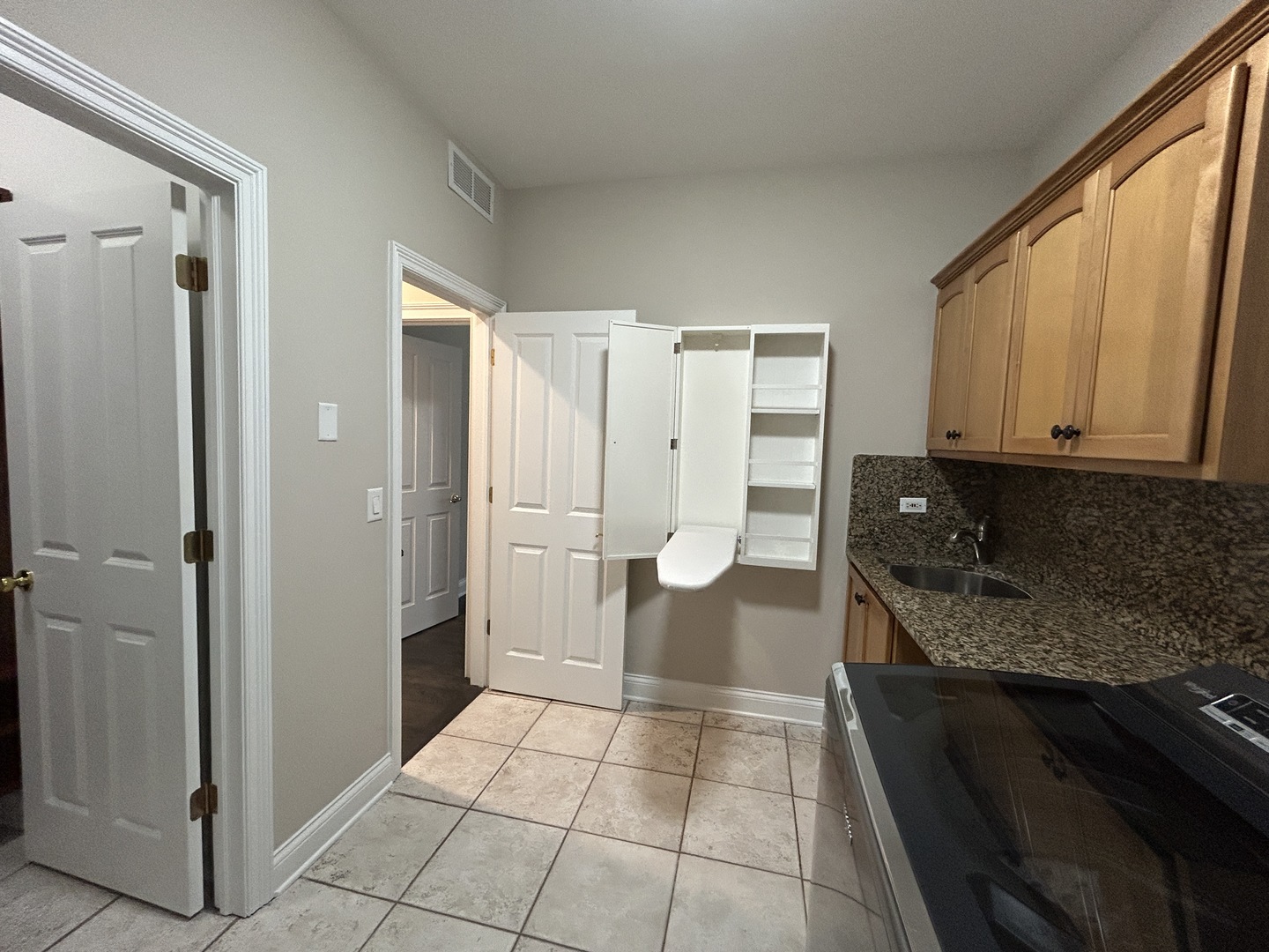 3932 Bluejay Lane Naperville, IL 60564 - Photo 19 of 50 a kitchen with stainless steel appliances granite countertop a refrigerator and a stove